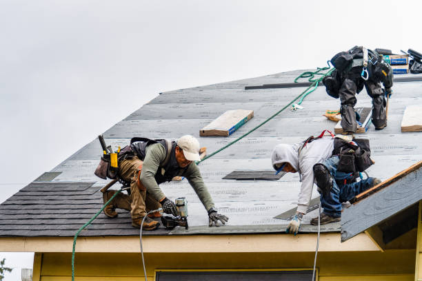 Professional Gutter Installation technician working in State Farm, VA